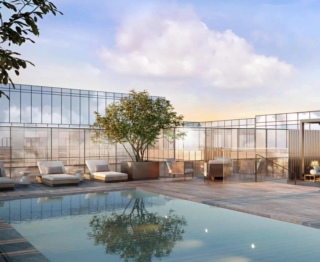Modern terrace rooftop pool at The Glenhill Hotel North York, featuring a sleek pool deck and lounge chairs.