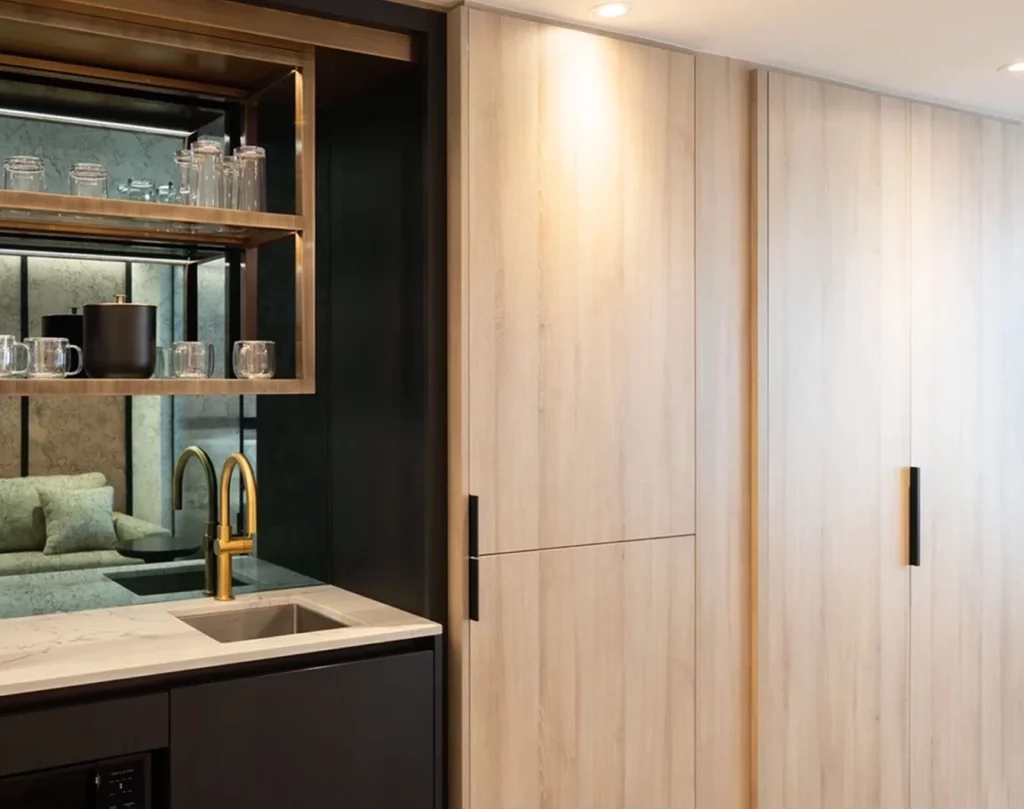 Luxury hotel suite wet bar and storage within the suite at The Glenhill Hotel North York