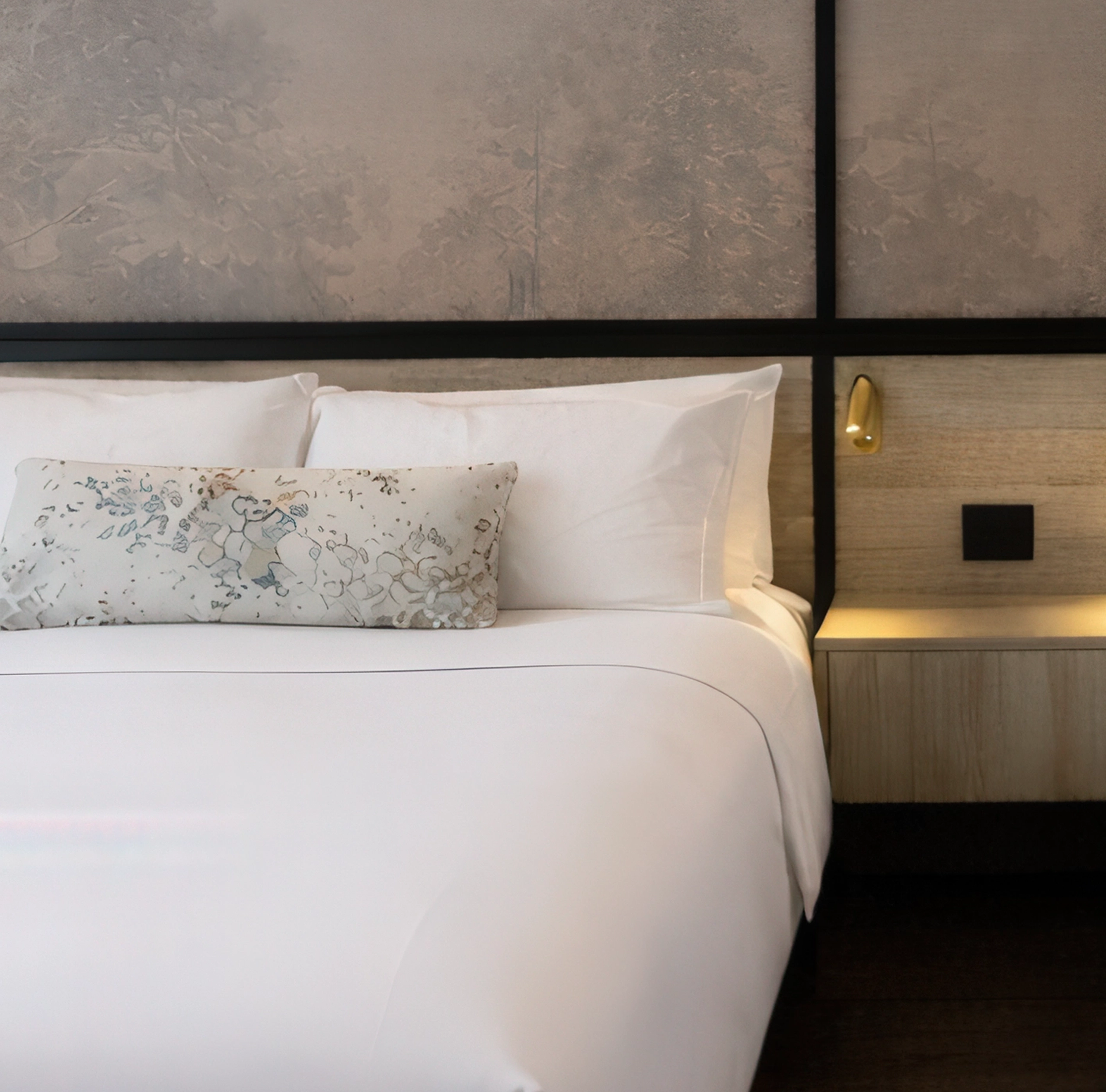 Luxury hotel suite at The Glenhill Hotel in North York with a King bed and premium white linens, a high-end headboard, and elegant boutique finishes