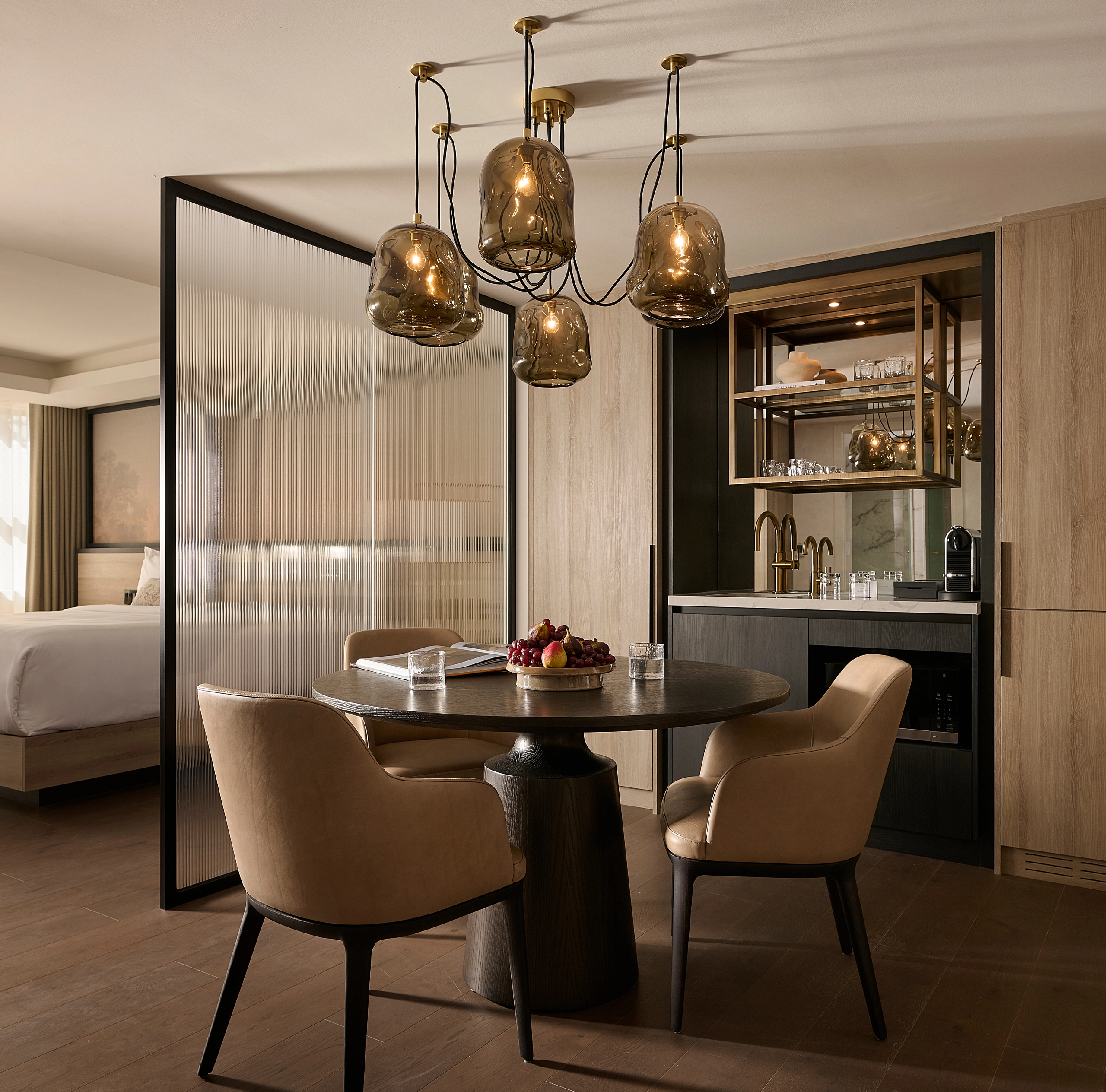 Luxury hotel suite at Glenhill Hotel North York featuring two queen-size beds with premium white linens, high-end headboards, and elegant boutique finishes